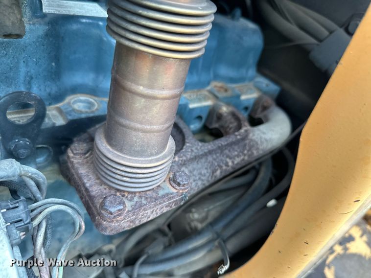 image for item NY9219 2000 Case 560  trencher with trailer