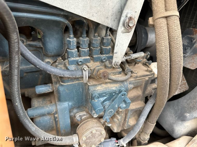 image for item NY9219 2000 Case 560  trencher with trailer