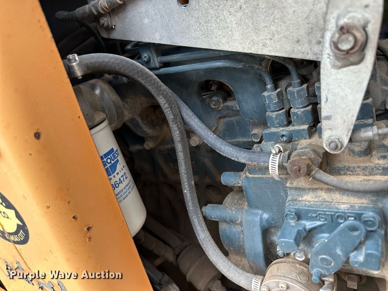 image for item NY9219 2000 Case 560  trencher with trailer