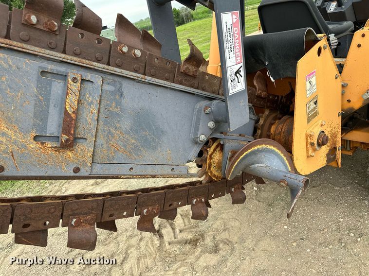 image for item NY9219 2000 Case 560  trencher with trailer