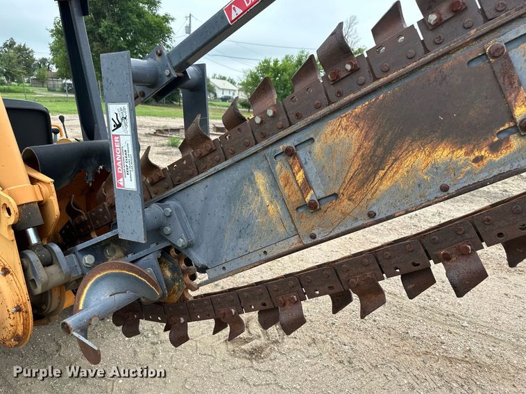 image for item NY9219 2000 Case 560  trencher with trailer