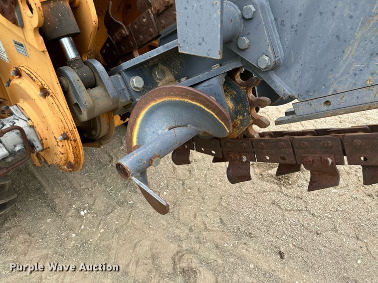 image for item NY9219 2000 Case 560  trencher with trailer