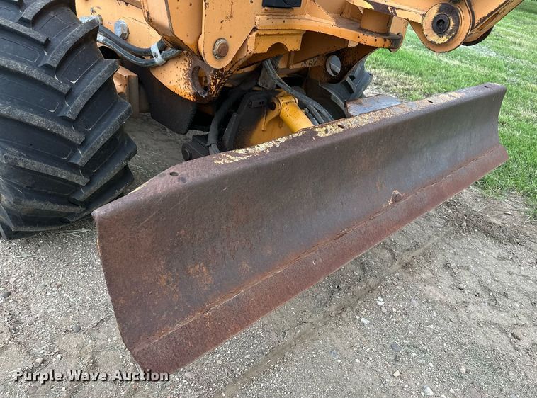 image for item NY9219 2000 Case 560  trencher with trailer