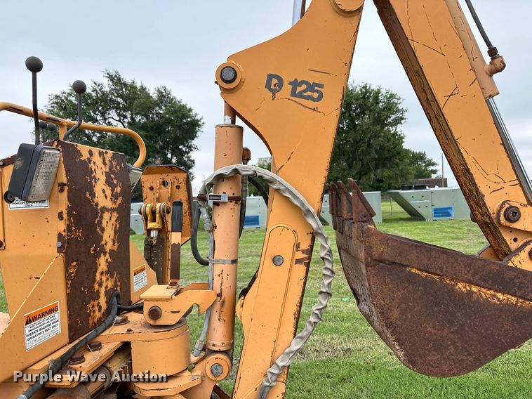 image for item NY9219 2000 Case 560  trencher with trailer