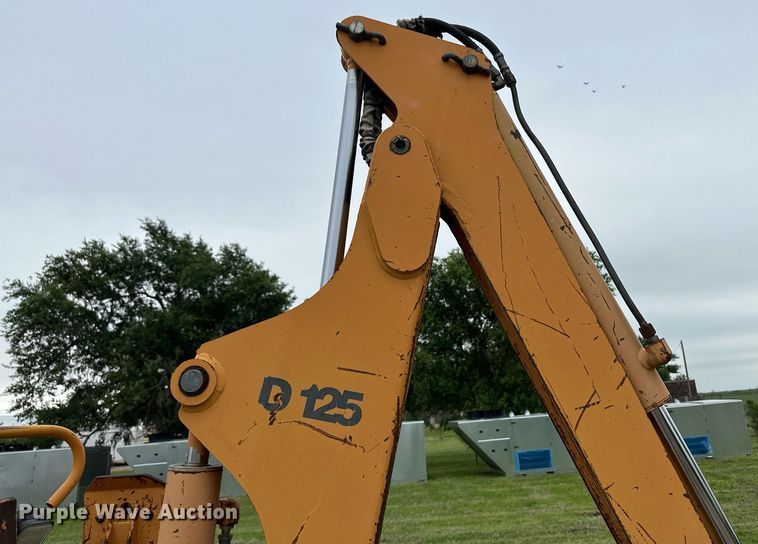 image for item NY9219 2000 Case 560  trencher with trailer