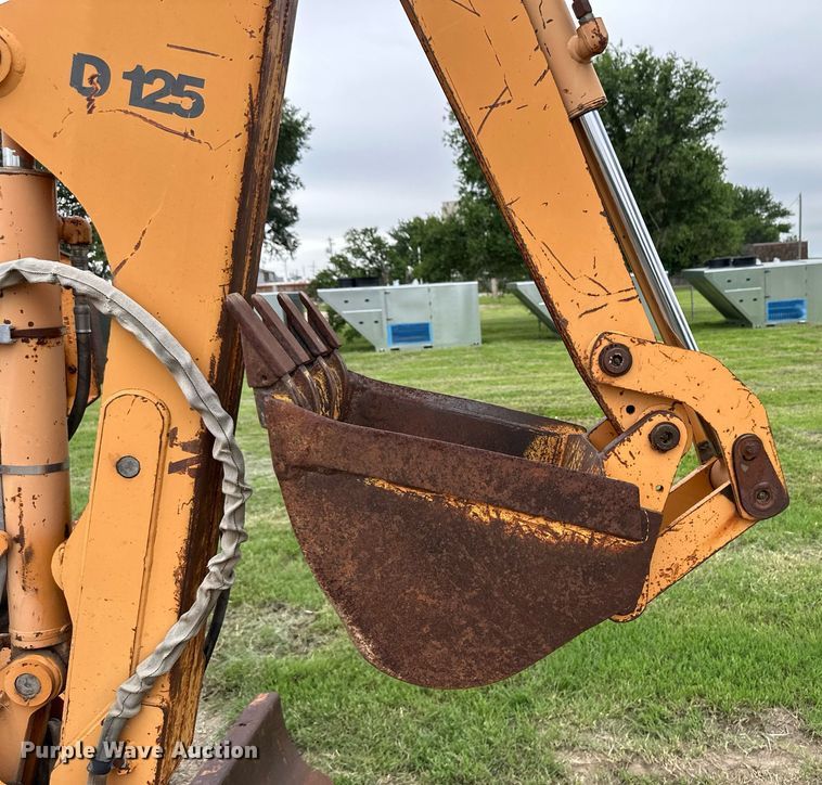 image for item NY9219 2000 Case 560  trencher with trailer