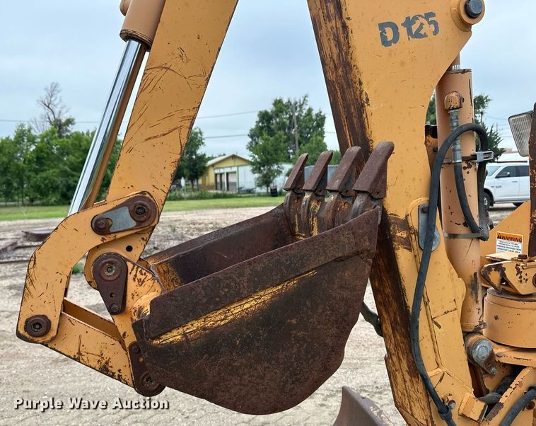 image for item NY9219 2000 Case 560  trencher with trailer
