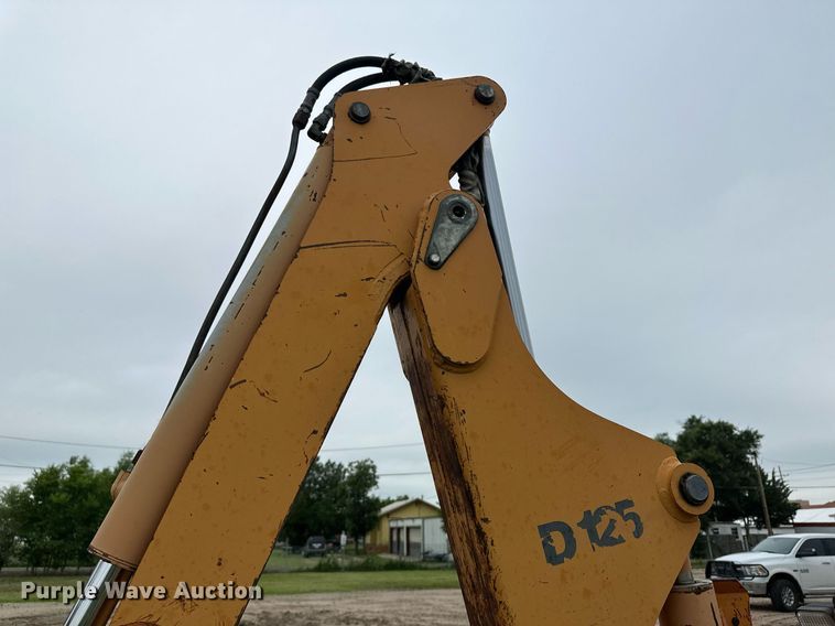 image for item NY9219 2000 Case 560  trencher with trailer