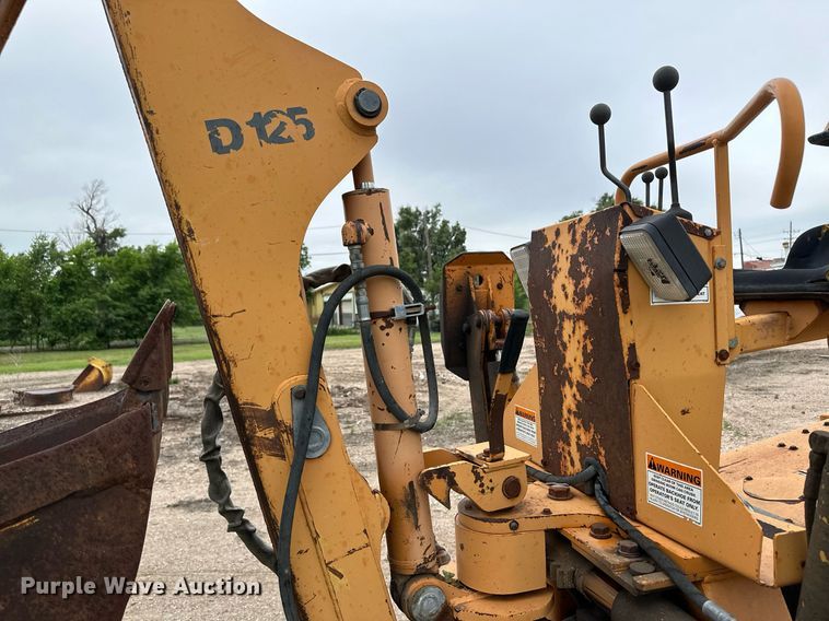 image for item NY9219 2000 Case 560  trencher with trailer