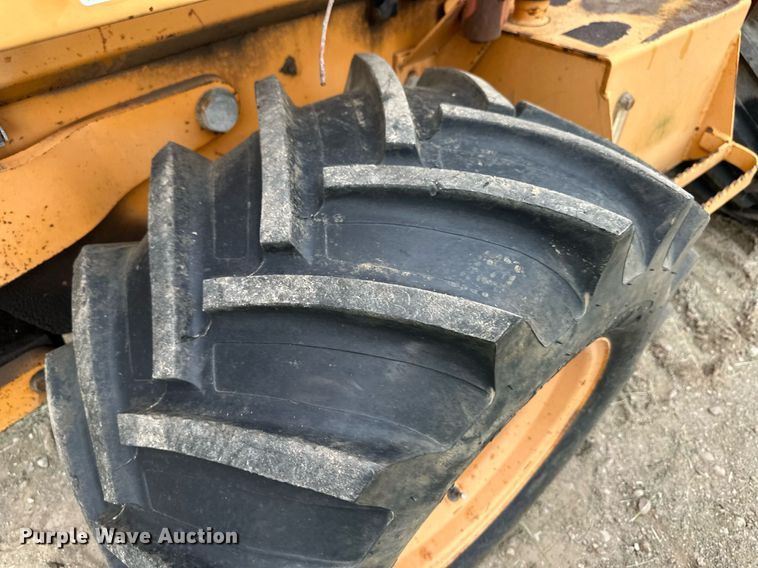 image for item NY9219 2000 Case 560  trencher with trailer