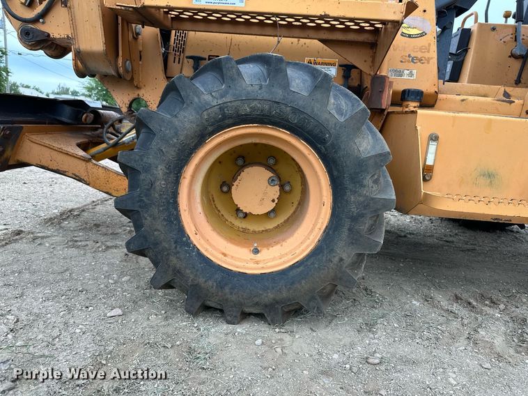 image for item NY9219 2000 Case 560  trencher with trailer