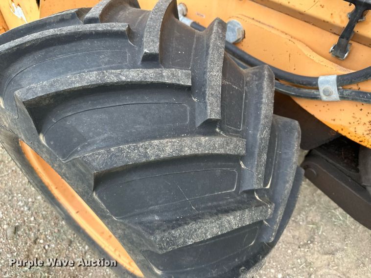 image for item NY9219 2000 Case 560  trencher with trailer