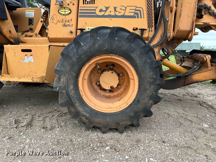 image for item NY9219 2000 Case 560  trencher with trailer