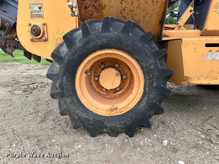 image for item NY9219 2000 Case 560  trencher with trailer