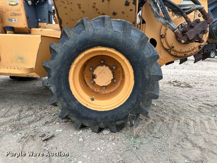 image for item NY9219 2000 Case 560  trencher with trailer