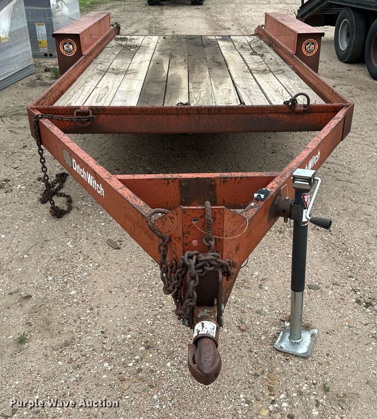 image for item NY9219 2000 Case 560  trencher with trailer