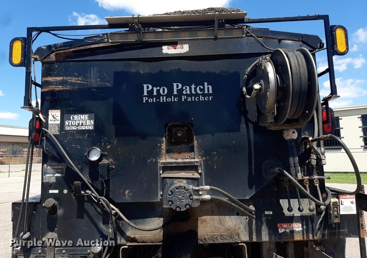 image for item DO3048 2012 Freightliner Business Class M2 pothole patcher truck