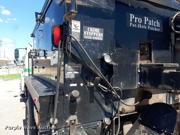 image for item DO3048 2012 Freightliner Business Class M2 pothole patcher truck