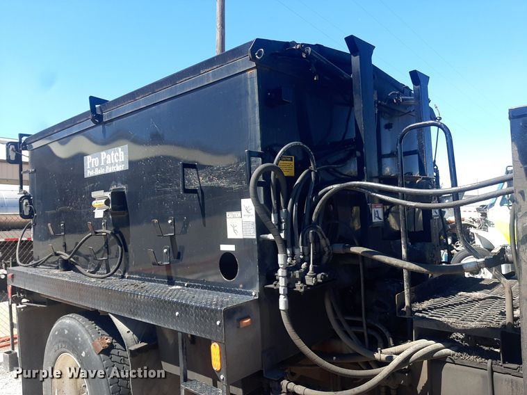 image for item NH9413 2012 Freightliner  Business Class M2 pothole patcher truck