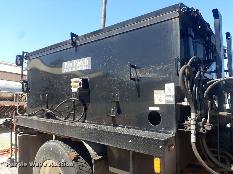 image for item NH9413 2012 Freightliner  Business Class M2 pothole patcher truck