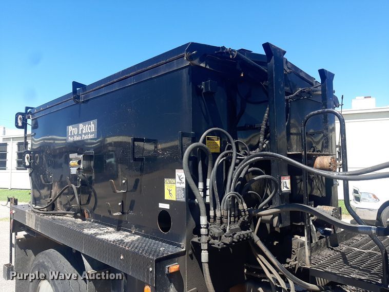 image for item NH9415 2012 Freightliner Business Class M2 pothole patcher truck