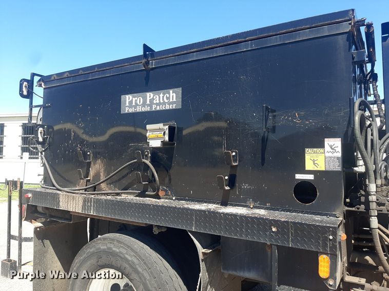 image for item NH9415 2012 Freightliner Business Class M2 pothole patcher truck