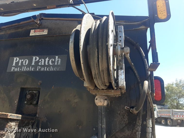 image for item NH9415 2012 Freightliner Business Class M2 pothole patcher truck