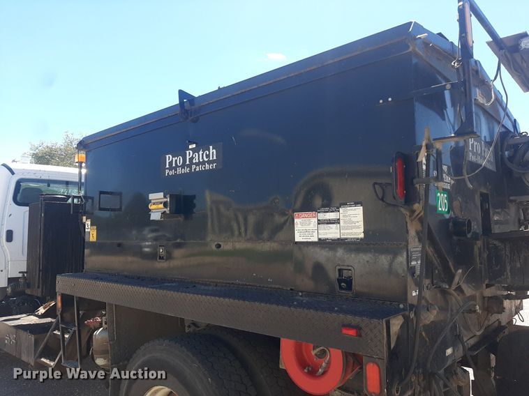 image for item NH9415 2012 Freightliner Business Class M2 pothole patcher truck