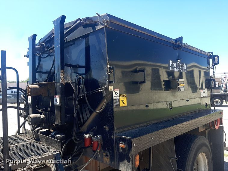 image for item NH9415 2012 Freightliner Business Class M2 pothole patcher truck