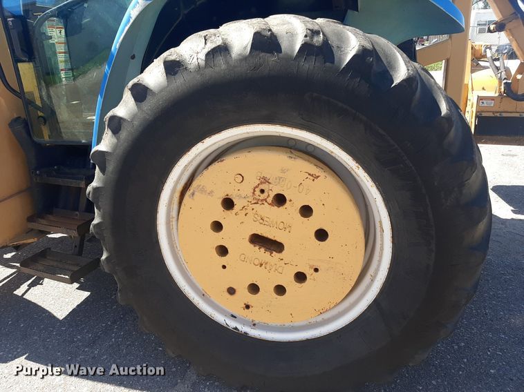 image for item NY9675 New Holland TS110 MFWD tractor