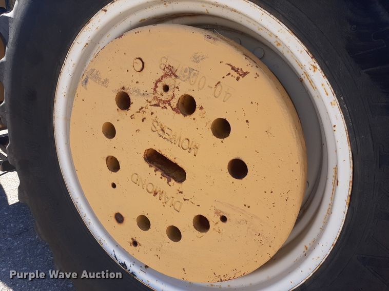 image for item NY9675 New Holland TS110 MFWD tractor