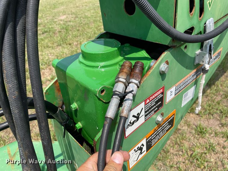 image for item HN9952 2009 John Deere 956  swather / windrower