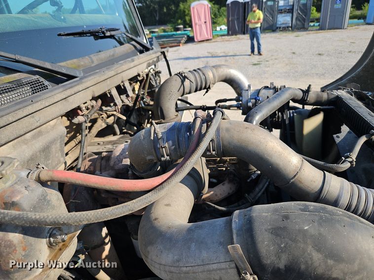 image for item DP2347 2000 Freightliner FL80  roll-off container truck