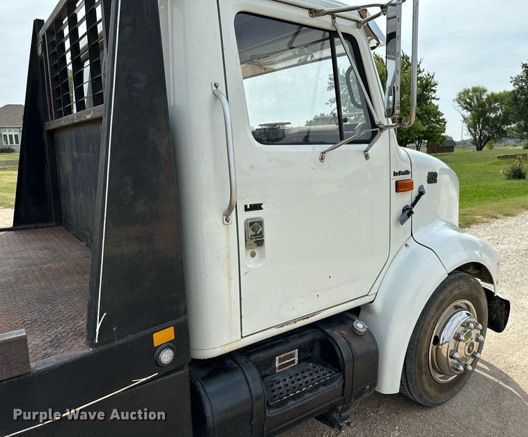 image for item HN9986 1998 International 4700  flatbed truck