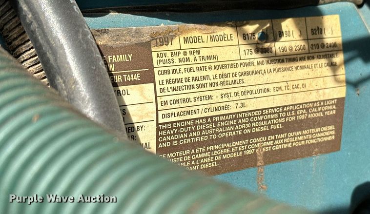 image for item HN9986 1998 International 4700  flatbed truck