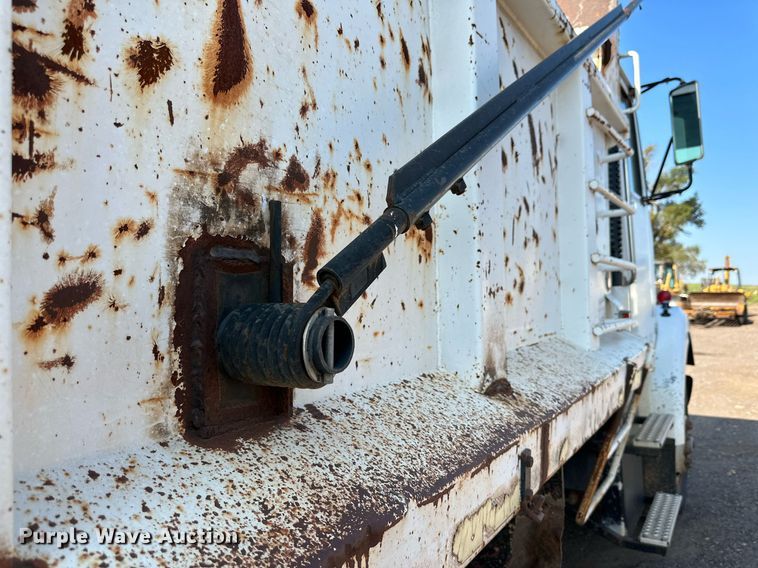 image for item KM9808 1989 White GMC WCS  dump truck