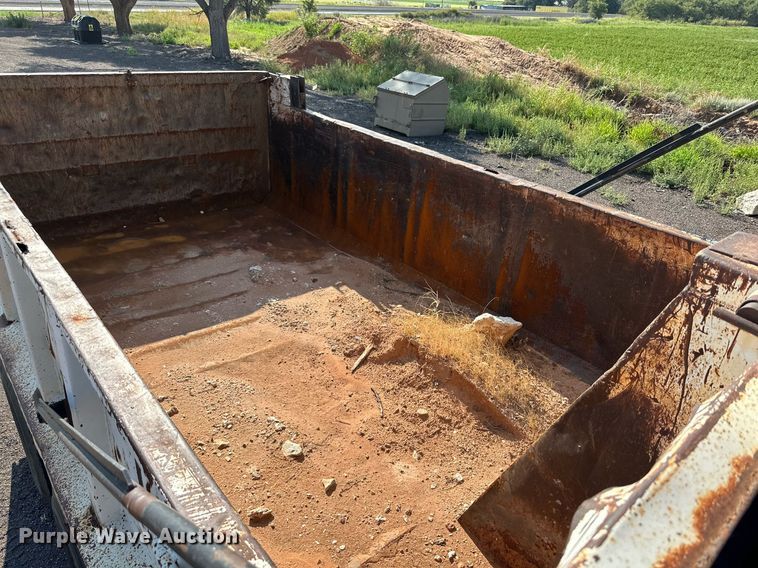 image for item KM9808 1989 White GMC WCS  dump truck