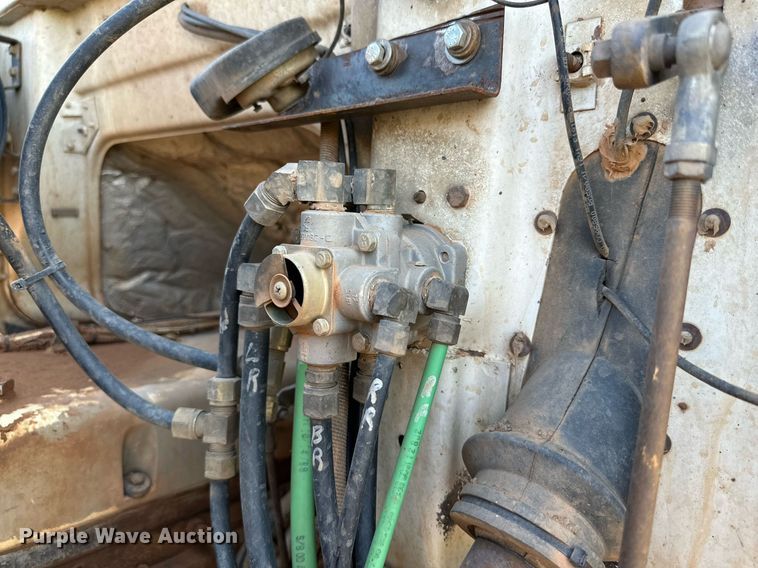 image for item KM9808 1989 White GMC WCS  dump truck