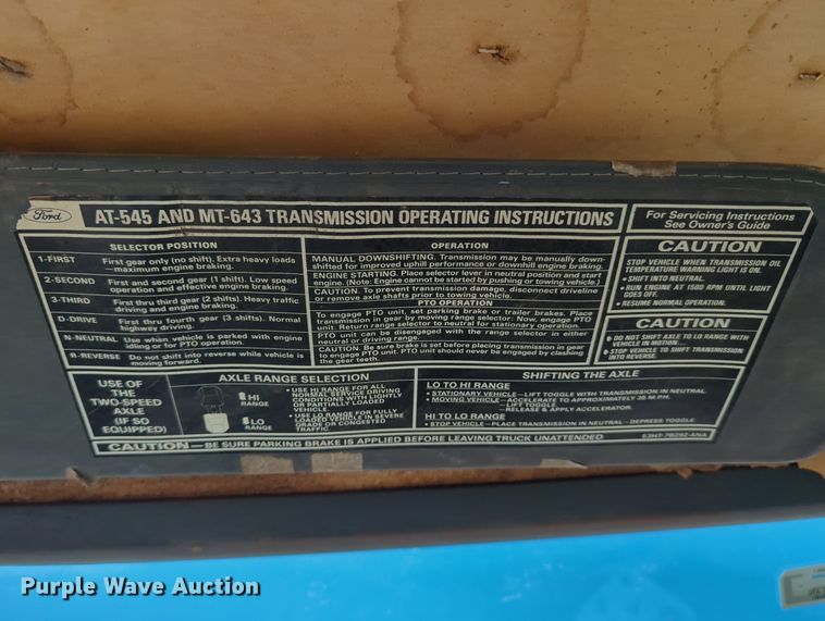 image for item LY9311 1985 Ford F700 flatbed truck