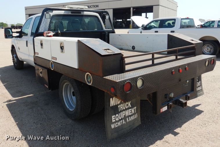 image for item DO3081 2016 Ford F350 Super Duty XL  Crew Cab flatbed pickup truck
