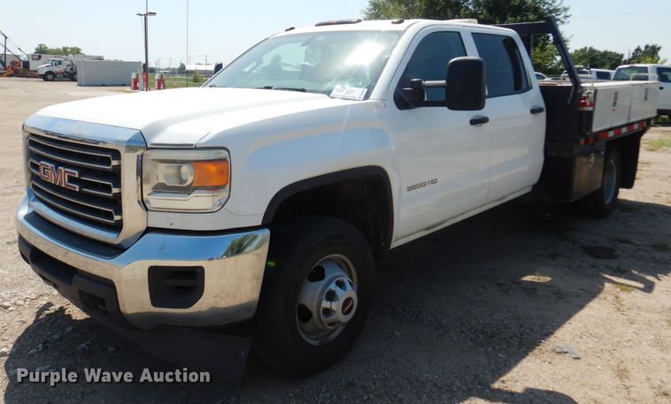 image for item DO3082 2015 GMC Sierra 3500HD  Crew Cab flatbed pickup truck