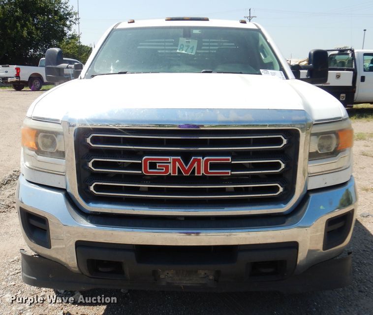 image for item DO3082 2015 GMC Sierra 3500HD  Crew Cab flatbed pickup truck