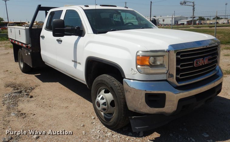 image for item DO3082 2015 GMC Sierra 3500HD  Crew Cab flatbed pickup truck