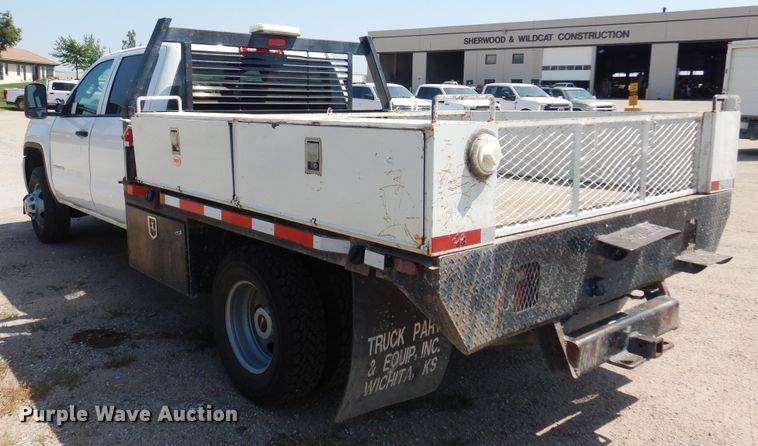 image for item DO3082 2015 GMC Sierra 3500HD  Crew Cab flatbed pickup truck