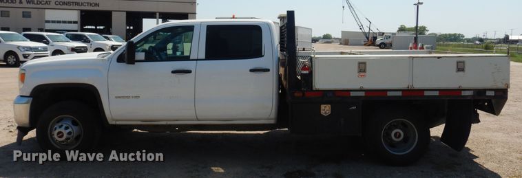 image for item DO3082 2015 GMC Sierra 3500HD  Crew Cab flatbed pickup truck
