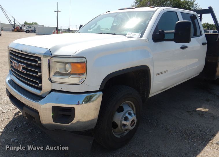 image for item DO3082 2015 GMC Sierra 3500HD  Crew Cab flatbed pickup truck