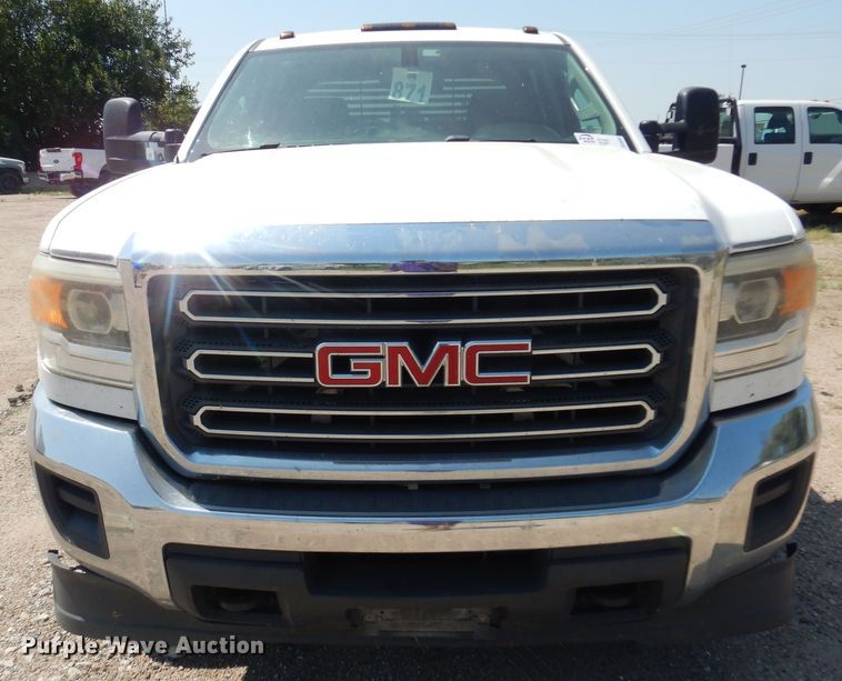 image for item DO3082 2015 GMC Sierra 3500HD  Crew Cab flatbed pickup truck