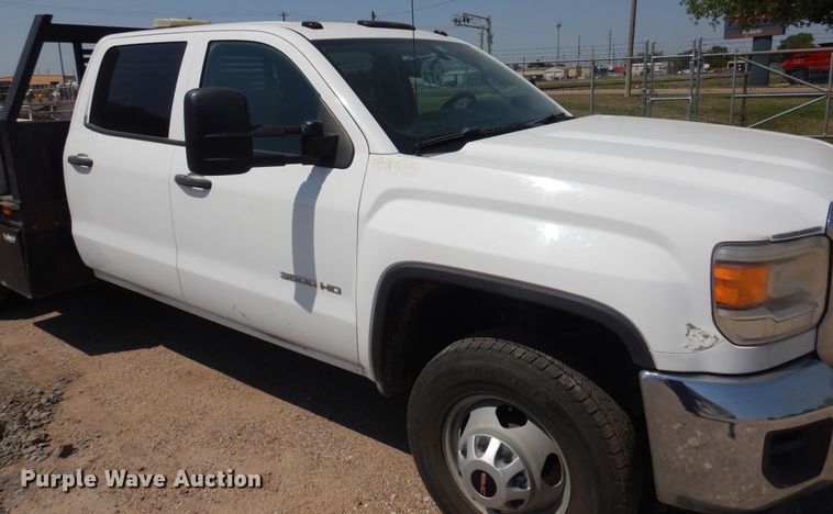 image for item DO3082 2015 GMC Sierra 3500HD  Crew Cab flatbed pickup truck