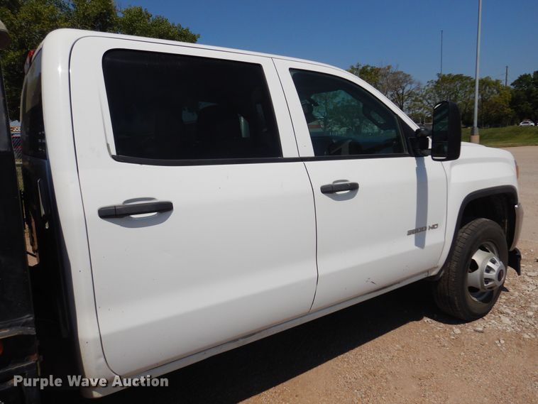 image for item DO3082 2015 GMC Sierra 3500HD  Crew Cab flatbed pickup truck