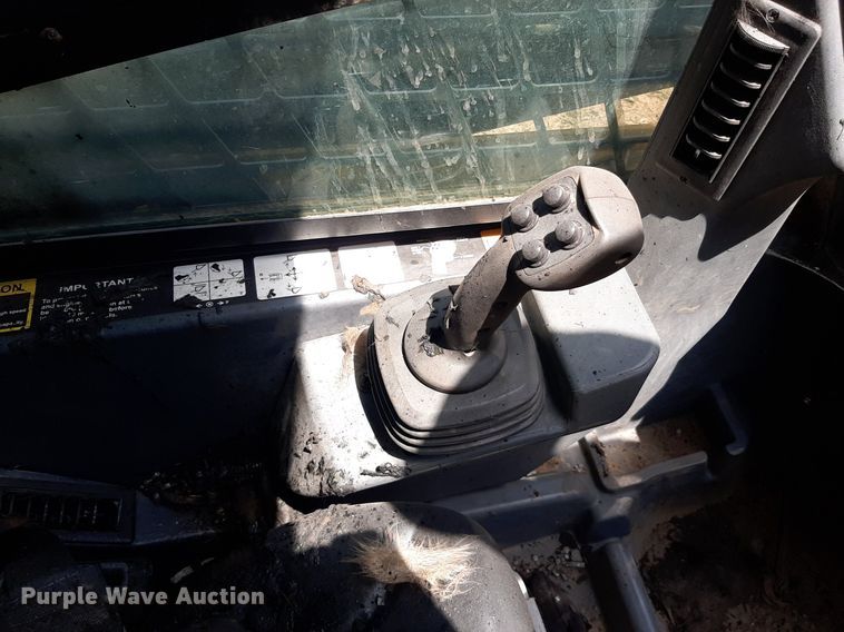 image for item DO3116 2013 John Deere 333E  tracked skid steer loader